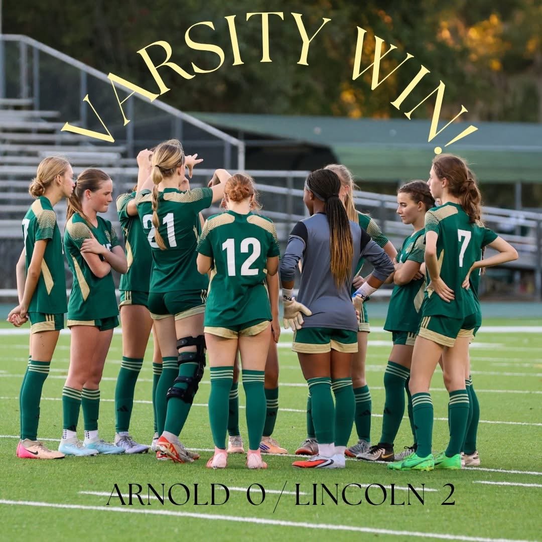 Lincoln girls soccer players together on the field